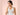 ผู้หญิงเอเชียกำลังจะกินยาคลายกล้ามเนื้อ พร้อมแก้วน้ำ — Intimo Life