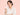 Naproxen คือยาอะไร ผู้หญิงถือแผงยาแก้ปวด | What is naproxen — woman holding a painkiller blister pack