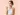 ผู้หญิงเอเชียถือแผงยา 2 แผง เปรียบเทียบยี่ห้อยาคลายกล้ามเนื้อ — Intimo Life