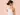 ผู้หญิงเอเชียกำลังนวดคอ บรรเทาอาการตึงกล้ามเนื้อ — ยาคลายกล้ามเนื้อ Intimo Life