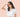 ผู้หญิงไมเกรน มือกางบังแสง ไวต่อแสง — อาการไมเกรน