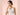 ผู้หญิงเอเชียกำลังจะกินยาคลายกล้ามเนื้อ พร้อมแก้วน้ำ — Intimo Life